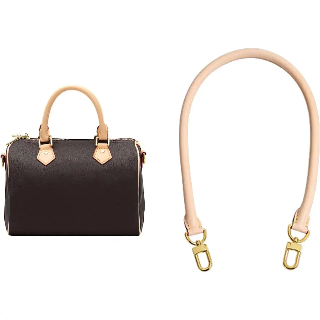 Tan leather replacement bag strap with gold hardware, shown with black handbag for styling