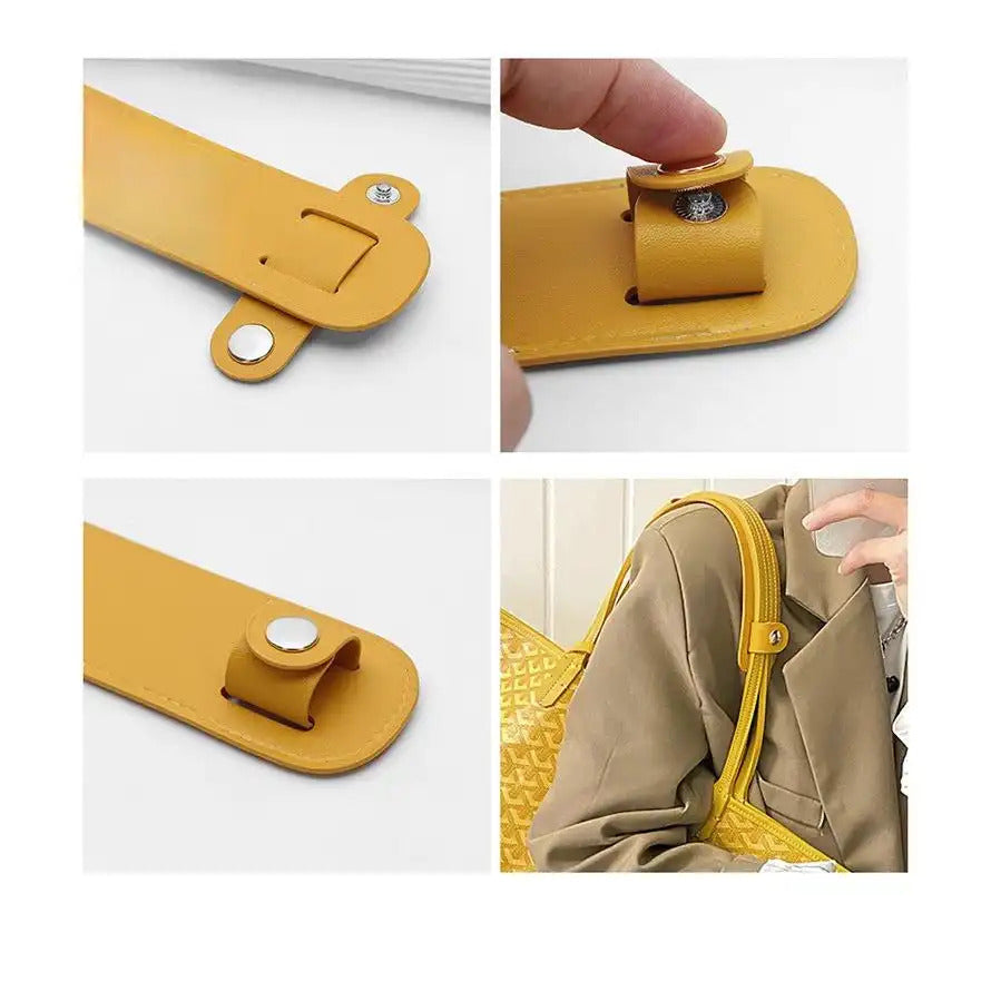 Mustard yellow leather bag strap with magnetic snap closure, shown installed on a handbag for easy replacement.