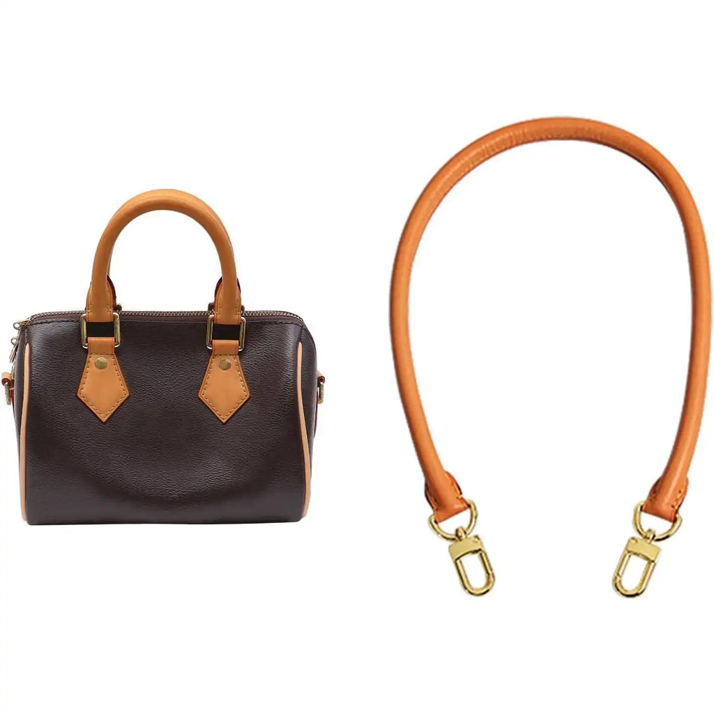 Brown leather handbag with tan straps and matching replacement shoulder strap, gold hardware